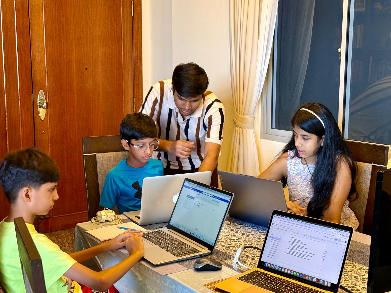 Instructor helping kids with Scratch